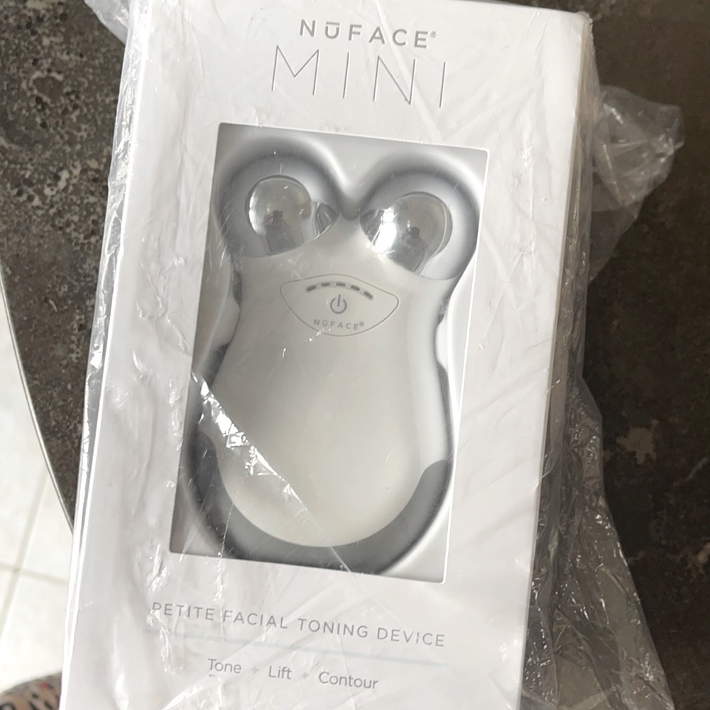 NuFACE Mini petite facial toning device. Brand new still in box and plastic.
